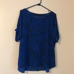 Beautiful blue shirt with leafy print
